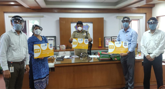 Revathy Ashok handed over face shields to Bhaskar Rao, Commissioner of Police